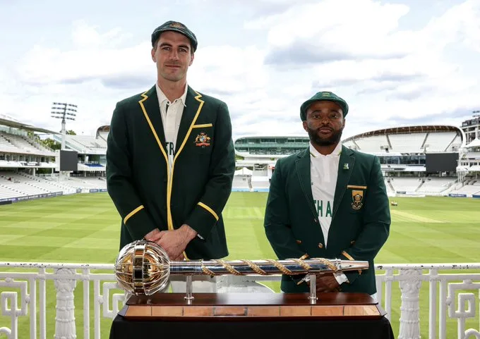 Cummins and temba bavuma with wtc trophy